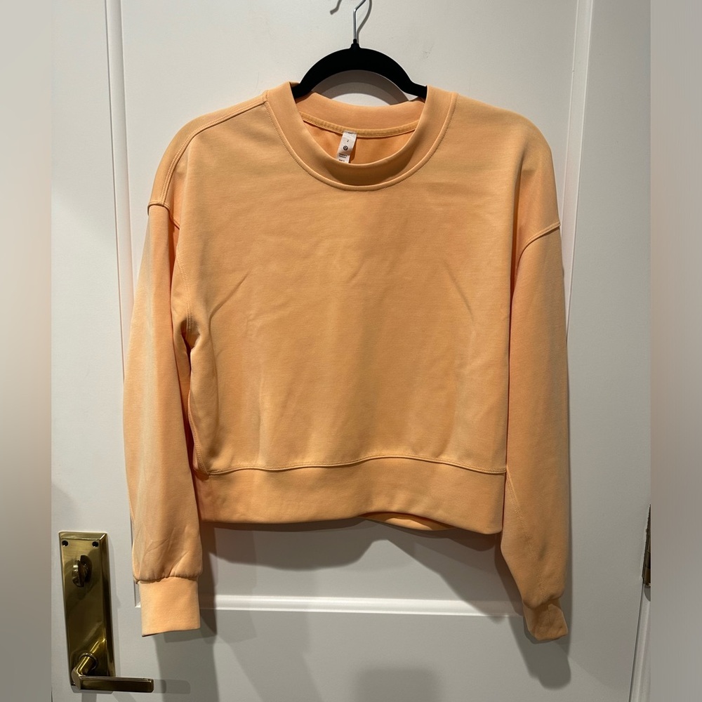 Lululemon Sweatshirt. Size 2. Cantaloupe color. Excellent condition.